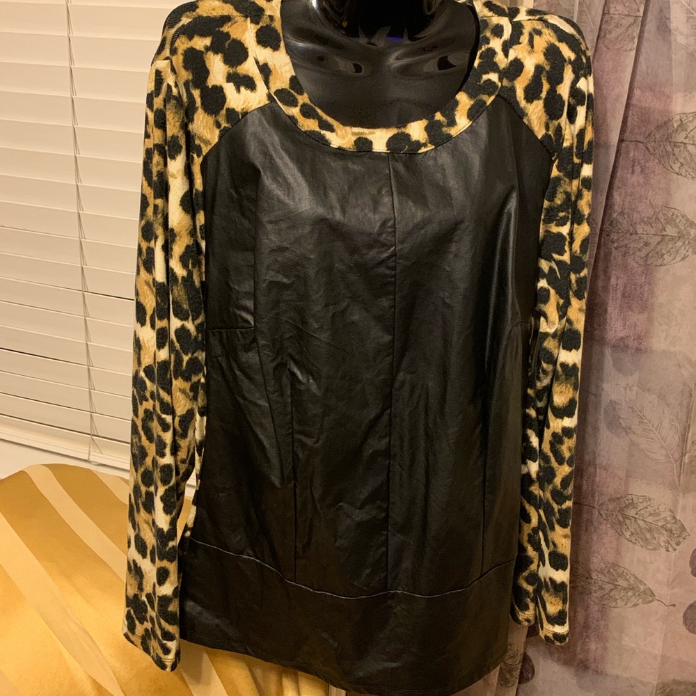 Animal print faux leather shirt. NWOT.